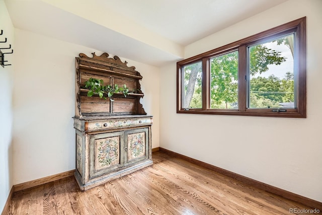 5475 W Ottawa Ave, Littleton, CO 80128 - interior space featuring baseboards and light wood finished floors