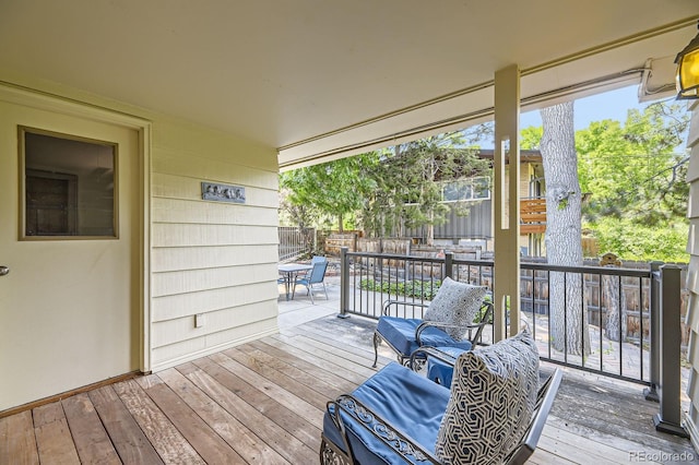 5475 W Ottawa Ave, Littleton, CO 80128 - deck featuring a fenced backyard