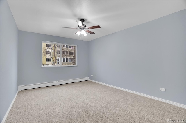 empty room featuring a ceiling fan, carpet, baseboards, and baseboard heating