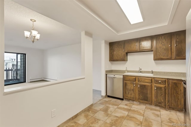 14001 E Marina Dr Unit 606, Aurora, CO 80014 - kitchen featuring stainless steel dishwasher, a sink, light countertops, a baseboard radiator, and decorative light fixtures