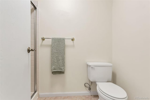 14001 E Marina Dr Unit 606, Aurora, CO 80014 - full bath with toilet, a shower stall, baseboards, and tile patterned floors