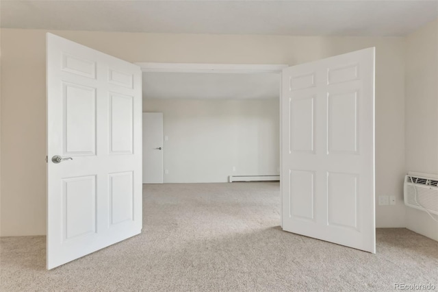 14001 E Marina Dr Unit 606, Aurora, CO 80014 - unfurnished room with carpet floors, a baseboard heating unit, and a wall unit AC