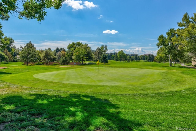14001 E Marina Dr Unit 606, Aurora, CO 80014 - view of home's community featuring golf course view, view of wooded area, and a lawn