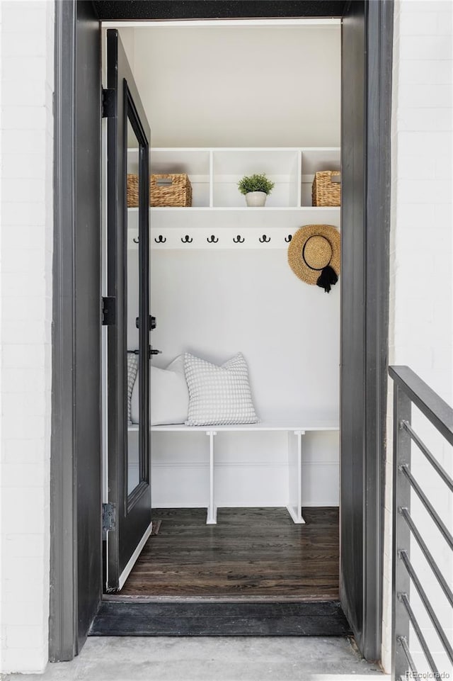 mudroom with dark hardwood / wood-style floors