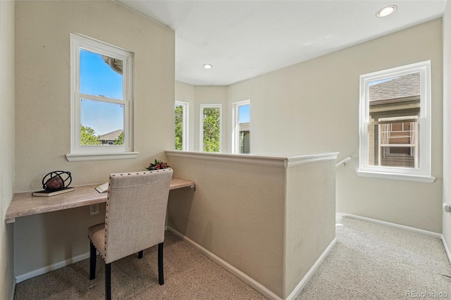 office with built in study area, carpet flooring, baseboards, and recessed lighting