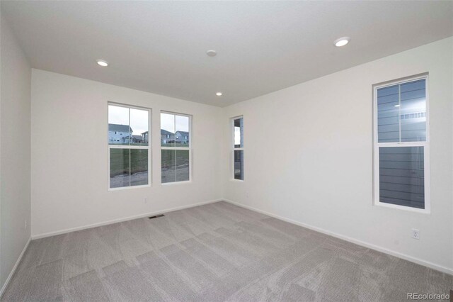 view of carpeted spare room