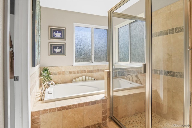 bathroom with independent shower and bath