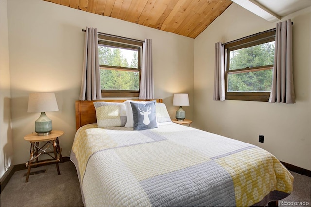 bedroom featuring carpet, lofted ceiling, and wooden ceiling