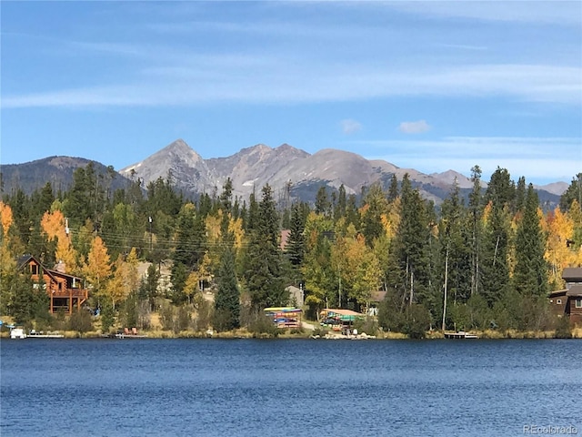 view of mountain feature featuring a water view