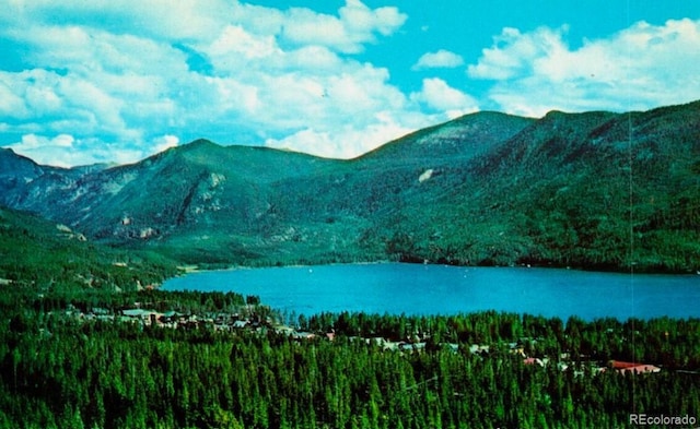 view of mountain feature featuring a water view