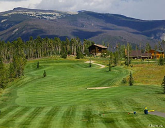 surrounding community featuring a mountain view