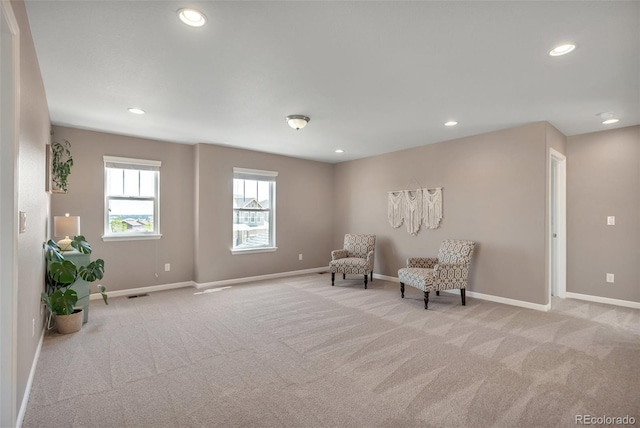 sitting room with carpet, baseboards, and recessed lighting