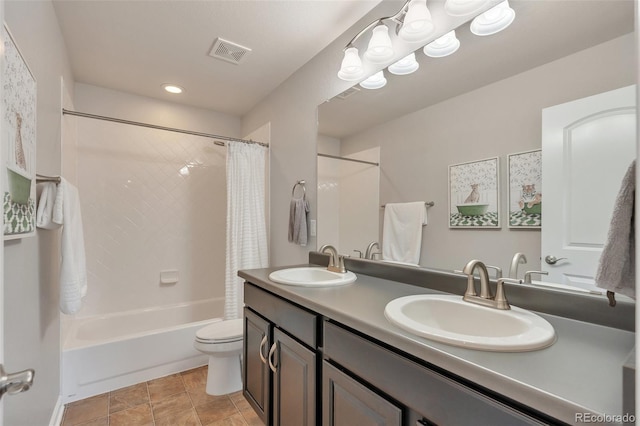 bathroom with toilet, shower / bath combination with curtain, and double vanity