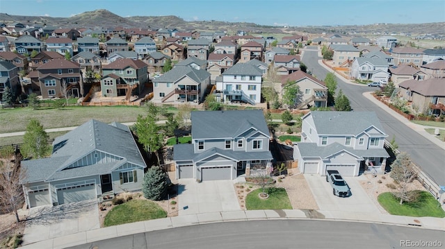 aerial perspective of suburban area featuring a mountain backdrop