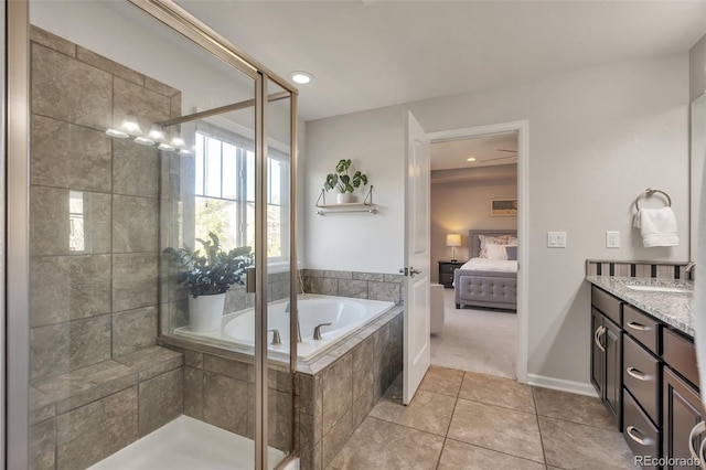 7665 Grady Cir, Castle Rock, CO 80108 - full bath with a garden tub, ensuite bathroom, tile patterned flooring, a shower stall, and vanity