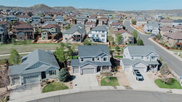 7665 Grady Cir, Castle Rock, CO 80108 - aerial view of residential area featuring a mountain backdrop