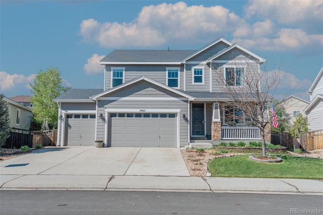7665 Grady Cir, Castle Rock, CO 80108 - craftsman-style home featuring a garage, a porch, and driveway