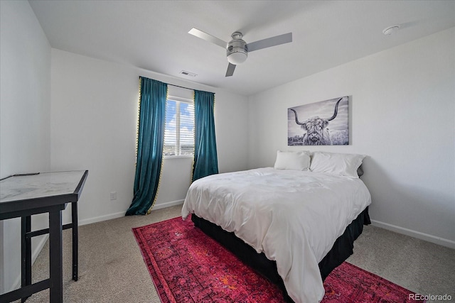 bedroom with visible vents, a ceiling fan, baseboards, and light carpet