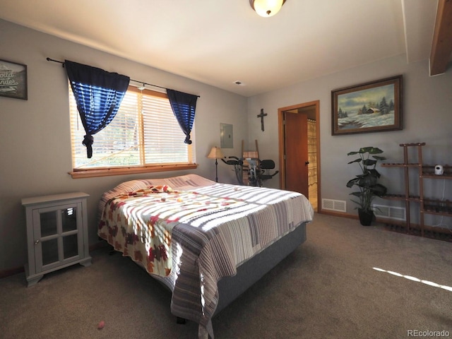 carpeted bedroom featuring baseboards, electric panel, and visible vents