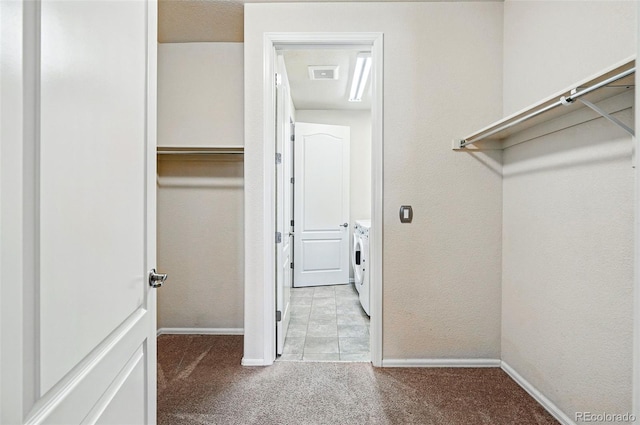 7426 E 148th Pl, Thornton, CO 80602 - spacious closet featuring separate washer and dryer and light carpet