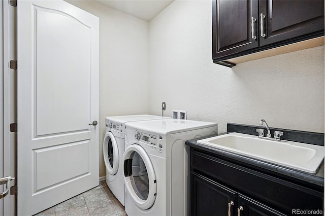 7426 E 148th Pl, Thornton, CO 80602 - laundry room with cabinet space, washer and dryer, and a textured wall