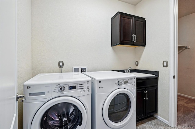 7426 E 148th Pl, Thornton, CO 80602 - laundry area featuring cabinet space, washer and dryer, and baseboards