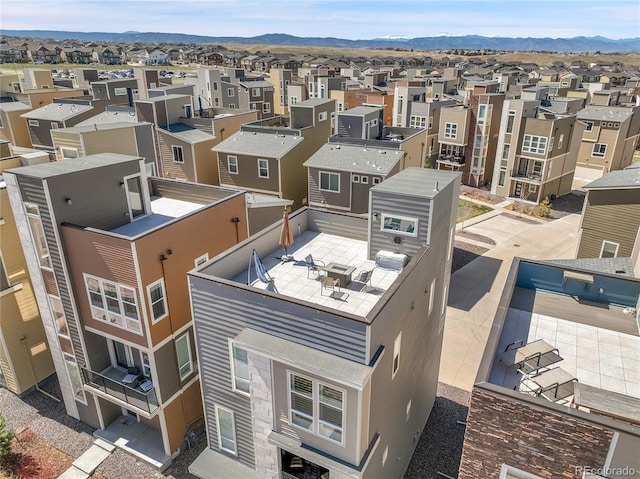 bird's eye view with a residential view and a mountain view