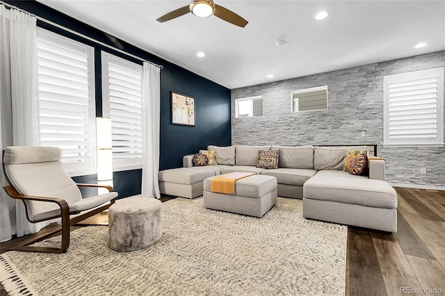 living area featuring recessed lighting, a ceiling fan, wood finished floors, and a healthy amount of sunlight