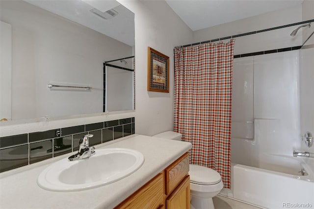 bathroom featuring toilet, vanity, shower / tub combo, and tasteful backsplash