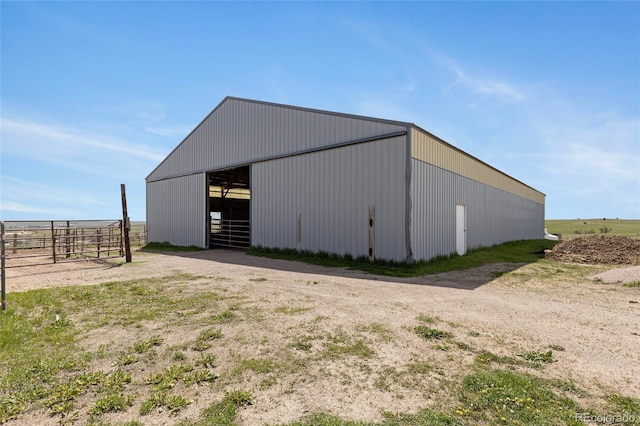 view of pole building with an exterior structure