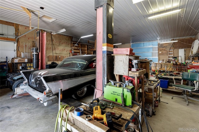 garage with a workshop area