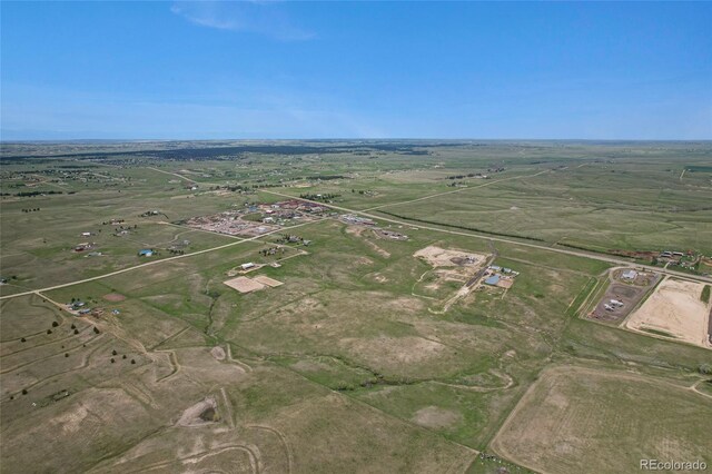 aerial view of property and surrounding area with rural landscape