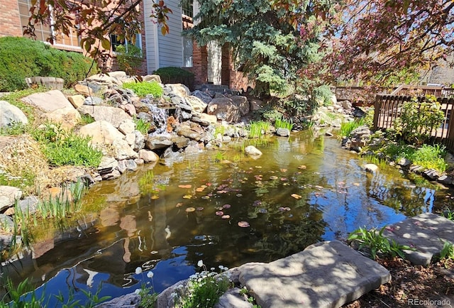 13873 E Lehigh Ave Unit E, Aurora, CO 80014 - exterior view of a garden pond