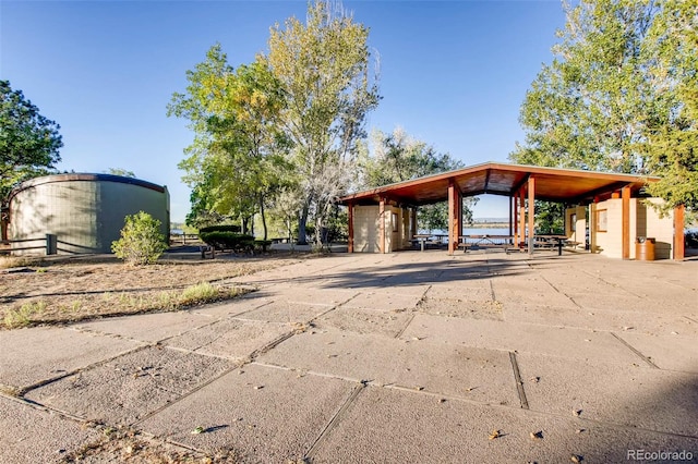 13873 E Lehigh Ave Unit E, Aurora, CO 80014 - view of vehicle parking with a carport