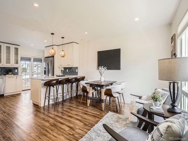 9430 Carr St, Westminster, CO 80021 - living room with dark wood-style floors, recessed lighting, and baseboards