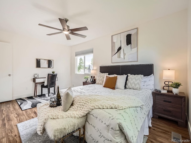 9430 Carr St, Westminster, CO 80021 - bedroom featuring wood finished floors, a ceiling fan, and baseboards