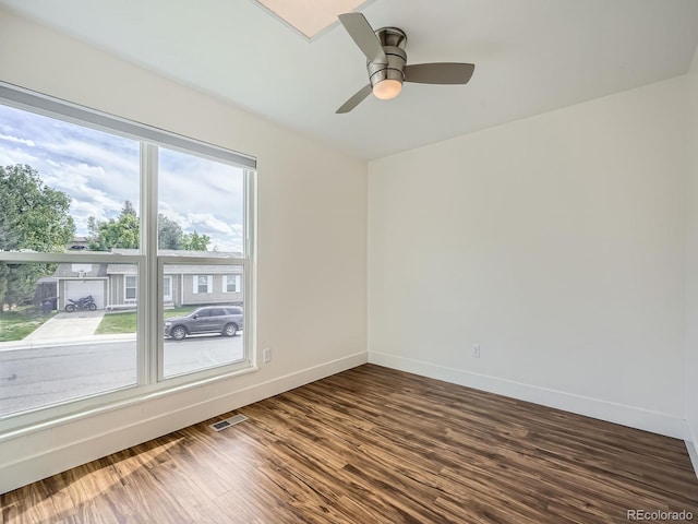 9430 Carr St, Westminster, CO 80021 - unfurnished room featuring baseboards, dark wood-style flooring, and a ceiling fan