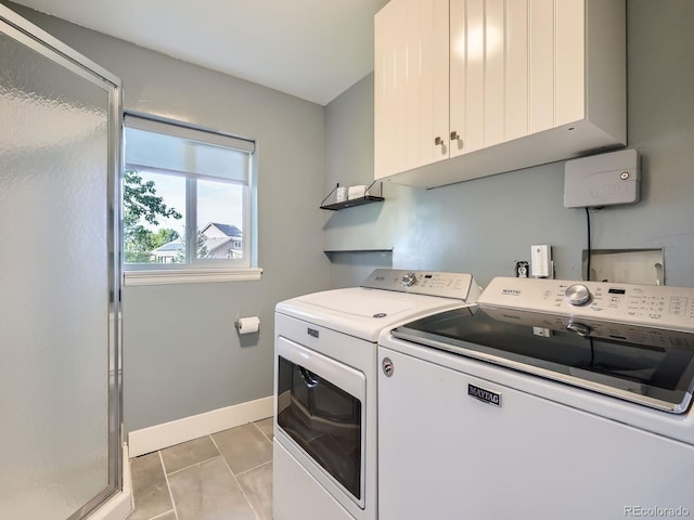 9430 Carr St, Westminster, CO 80021 - laundry area featuring washer and dryer, cabinet space, and baseboards