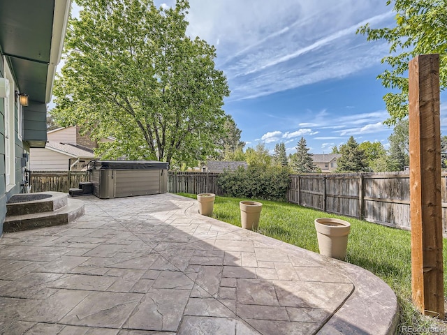 9430 Carr St, Westminster, CO 80021 - view of patio / terrace featuring a hot tub