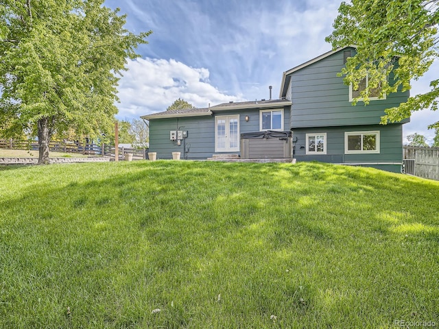9430 Carr St, Westminster, CO 80021 - rear view of house featuring french doors and a hot tub