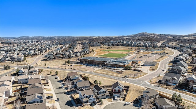 bird's eye view featuring a residential view and a mountain view