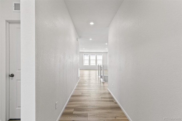 hall featuring light hardwood / wood-style floors