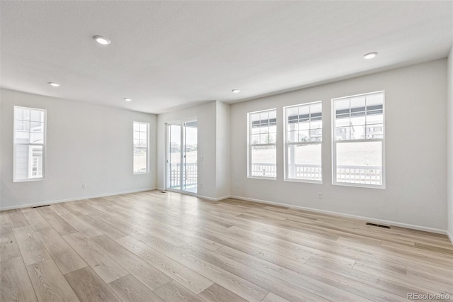 empty room featuring light hardwood / wood-style flooring