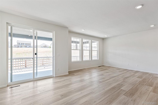 empty room featuring light hardwood / wood-style floors