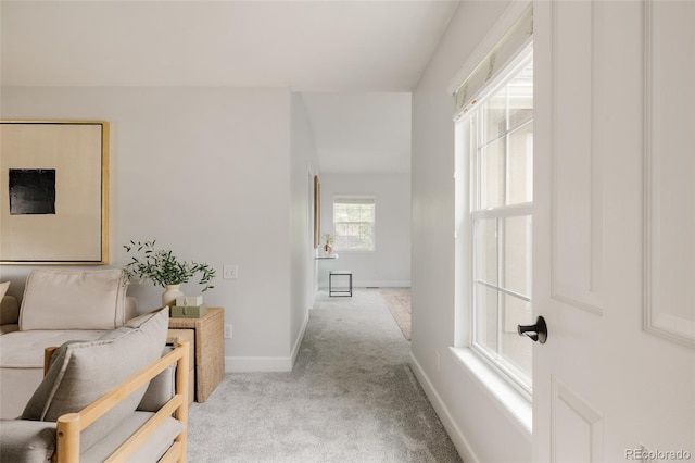 8122 E 6th Pl, Denver, CO 80230 - hallway featuring light carpet and baseboards