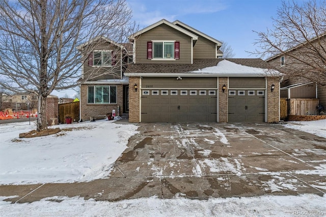 view of front of property featuring a garage