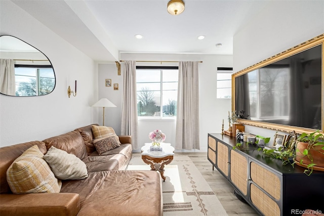 living area featuring recessed lighting and light wood-type flooring