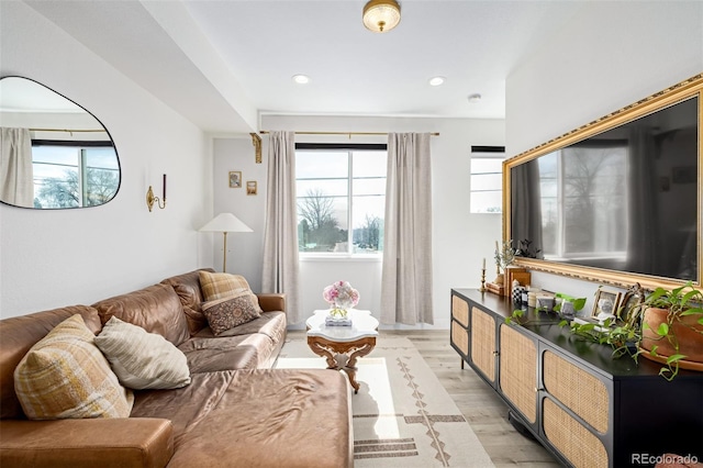 4925 W 10th Ave Unit 111, Denver, CO 80204 - living area with recessed lighting, light wood-type flooring, and a wealth of natural light