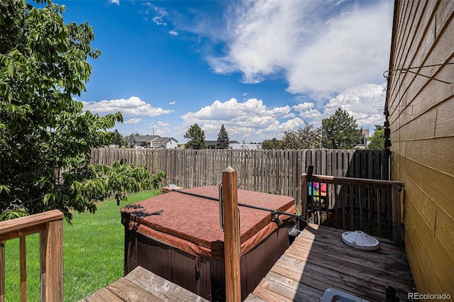 34181 Columbine Trl, Elizabeth, CO 80107 - deck featuring a covered hot tub and a fenced backyard