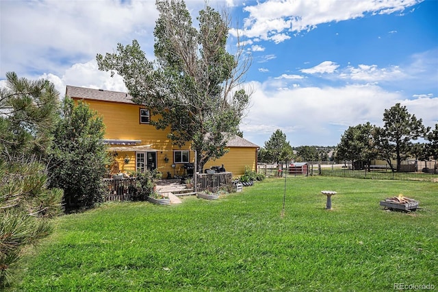 34181 Columbine Trl, Elizabeth, CO 80107 - view of yard with an outdoor fire pit and a patio